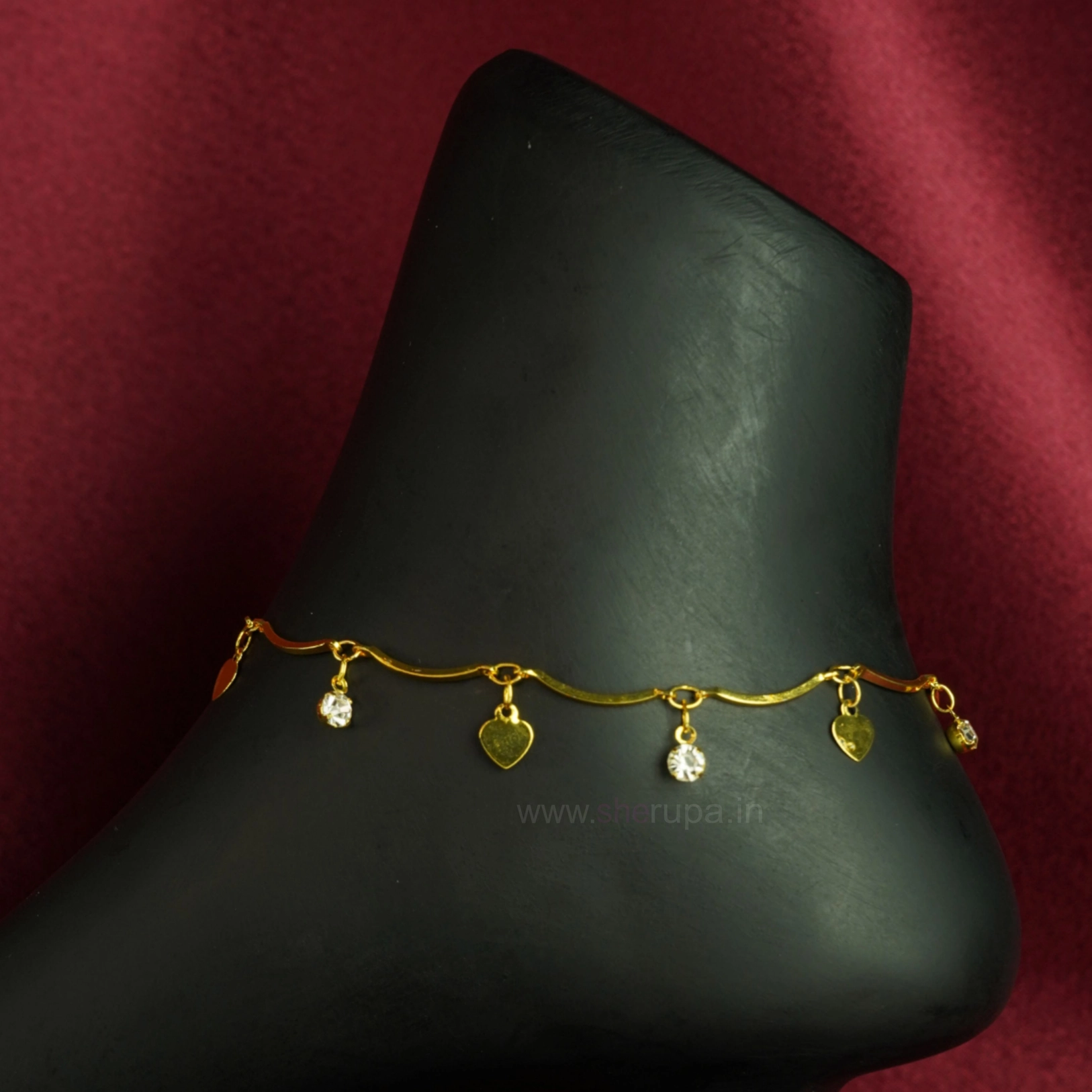 Minimalist Gold Tone Wave Chain Anklet Featuring Alternate Hanging Heart-Shaped Charms and White Crystal Stones | 1 Pair (2 Anklets)