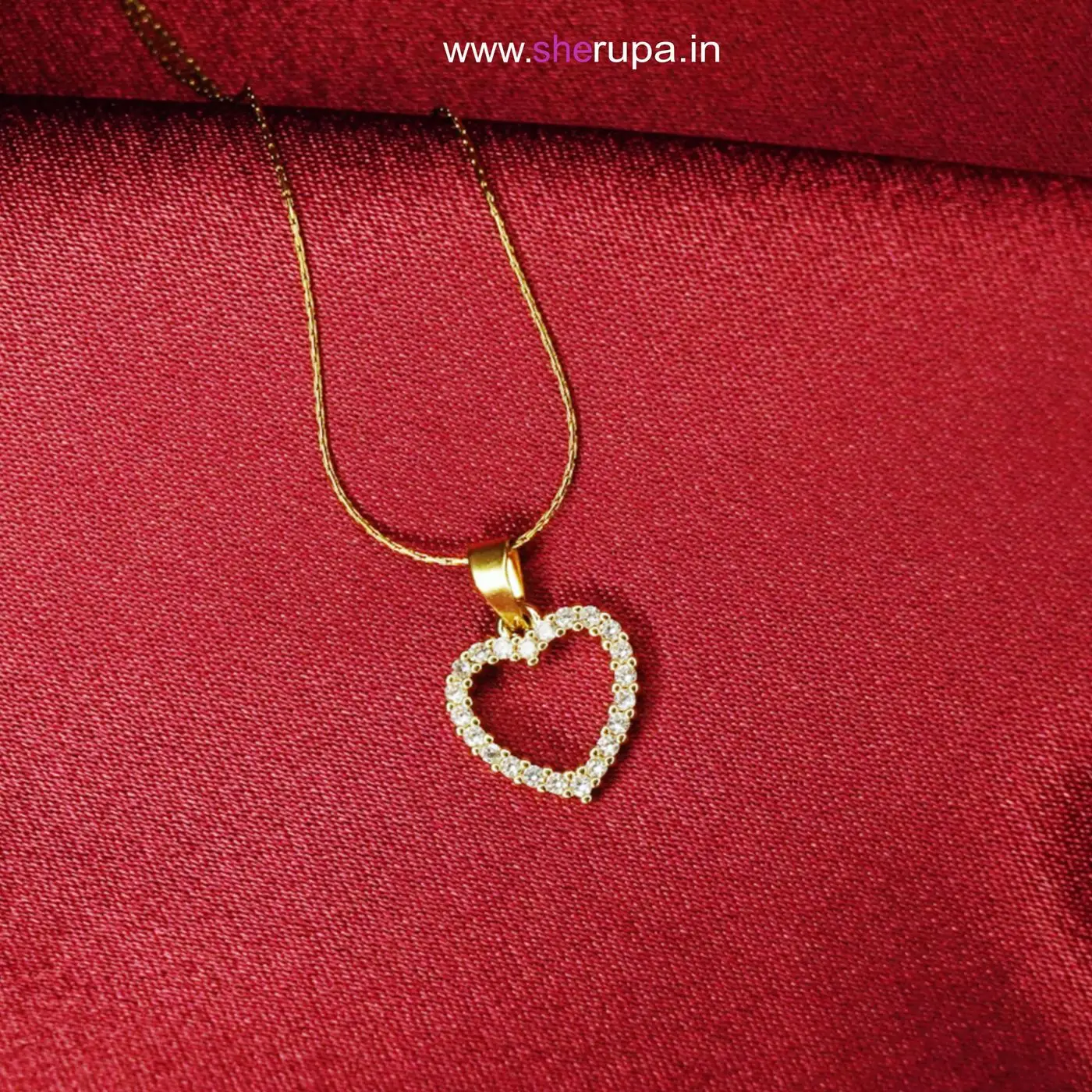 Gold Tone Heart Pendant Invisible Chain

Necklace