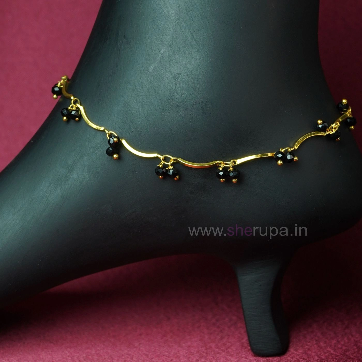 Gold Tone Twin Black Crystal Hanging Anklets