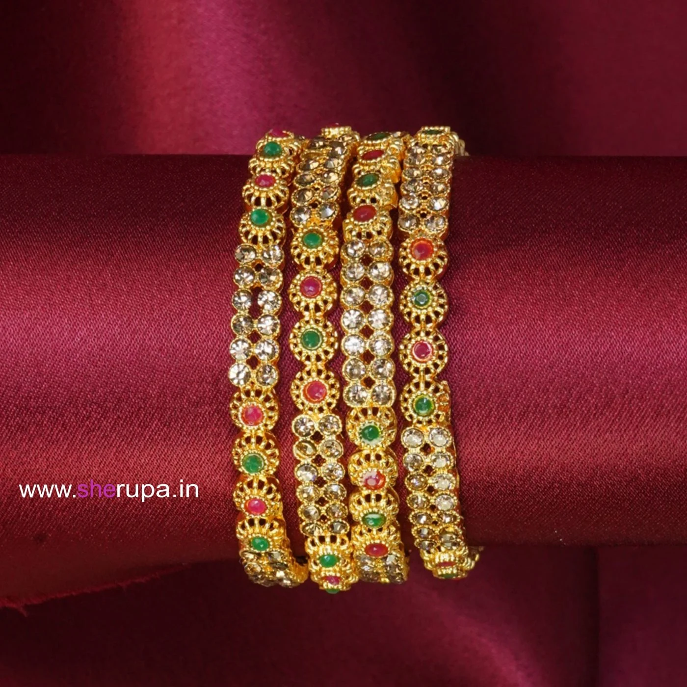 Traditional Gold Tone Bangle Set of 4 with Green, Red & Clear Stone Details