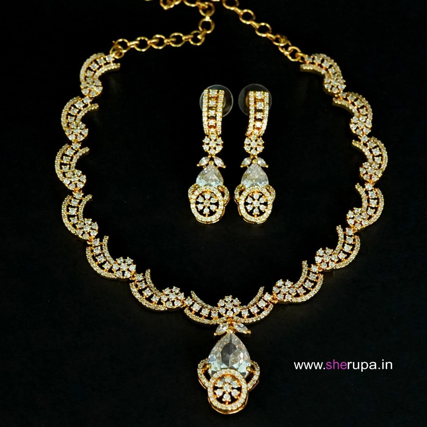 Gold Tone White Stone Bridal AD Necklace Set

with Earrings