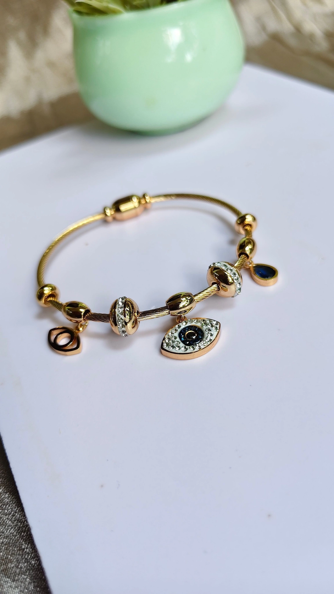 Evil eye hanging magnetic baby bangle 1